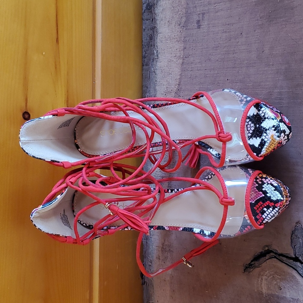 New Shoe Dazzle red snake lace platform heels. Size 7